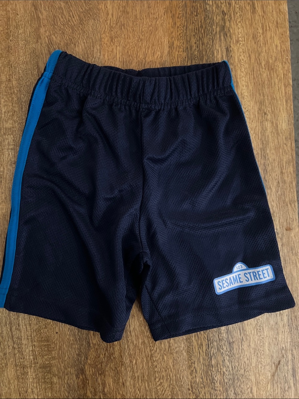 Sesame Street Black Shorts with Blue Side Stripe